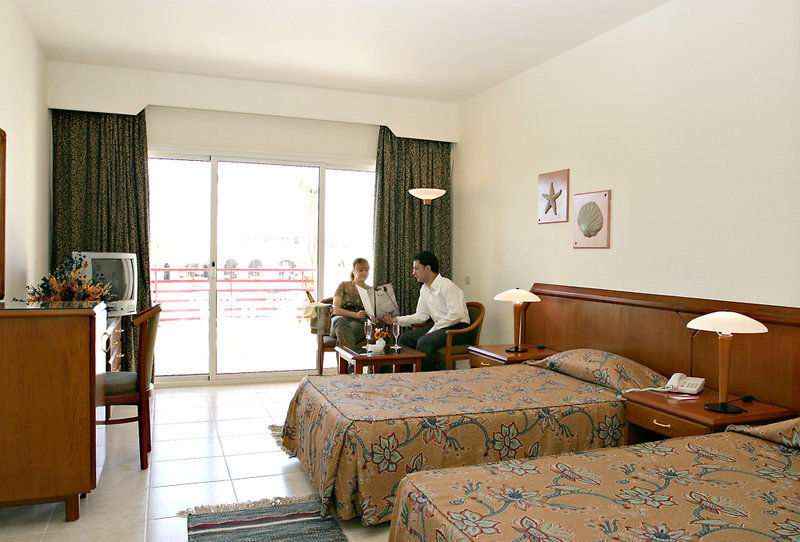 体验克罗赛兹园地酒店 沙姆沙伊赫 外观 照片 A room at the hotel